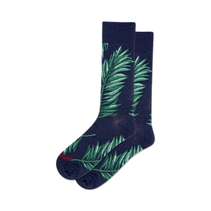 Pair of navy blue crew socks featuring a vibrant green palm leaf pattern. Comfortable and stylish. }}