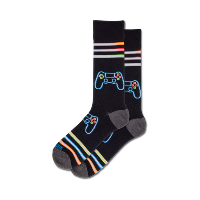 Pair of black crew socks with neon stripes and a neon gamepad design.