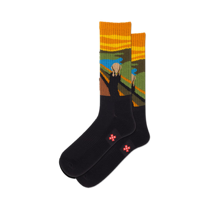 Pair of black crew socks with The Scream artwork on the upper part. The artwork features orange, yellow, blue, and green colors. }}