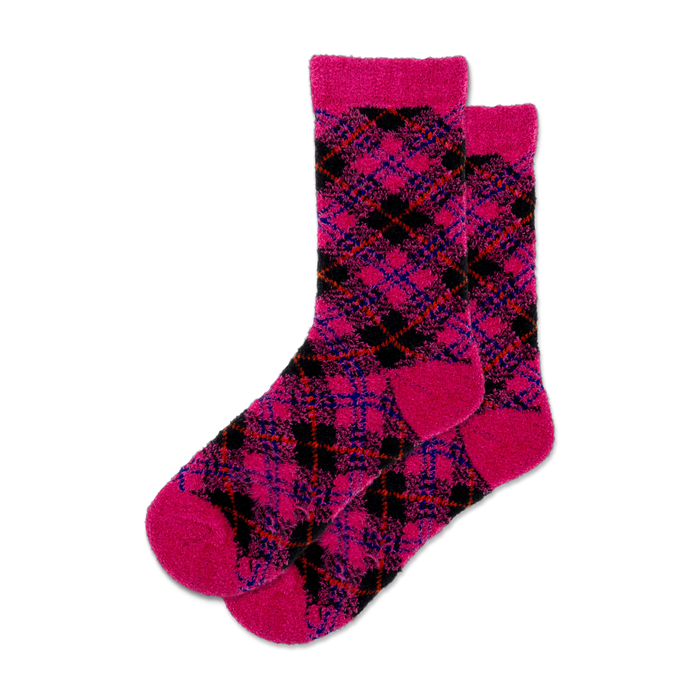 Pair of pink fuzzy socks with a diagonal black, blue, and red plaid pattern. Feathery soft boot socks. }}
