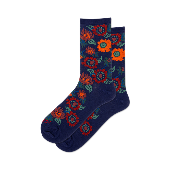 Lifestyle shot of Fuzzy Flowers socks on a person's feet, showcasing the socks' fit and color in a casual setting.