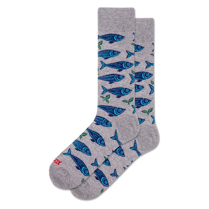 Pair of grey crew socks with an all-over pattern of blue sardines and small green leaves, displayed on a white background.