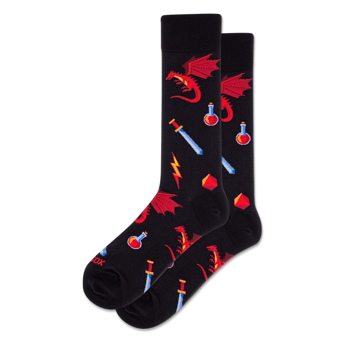 Pair of black crew socks with a pixelated pattern featuring red dragons, blue swords, red potions, red dice, and yellow lightning bolts. }}