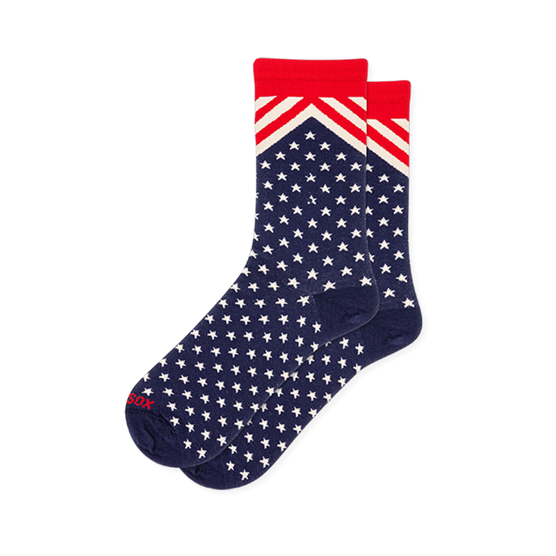 Navy blue crew socks covered in white stars, featuring a red and white chevron stripe pattern below a solid red cuff.