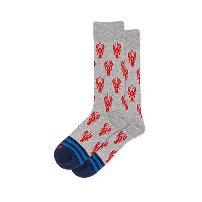 Light gray crew socks with a repeating bright red lobster pattern, finished with navy toes and bright blue stripes.
