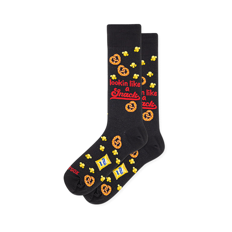 Black crew socks showing a pattern of pretzels, popcorn, snack bags, and red text reading lookin like a snack.