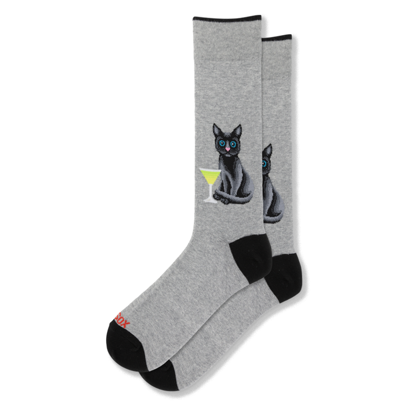 Light grey crew socks with a black cat sitting by a green martini glass, finished with a black toe and heel.