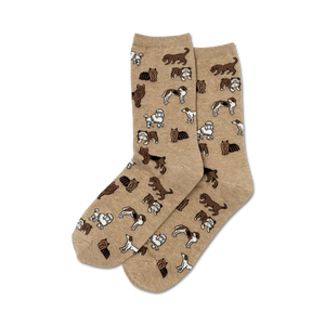 Pair of beige crew socks with a repeating pattern of various brown and white dogs.