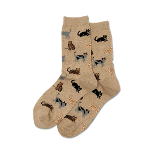 Pair of beige crew socks with a pattern of various cats in gray, brown, and black.
