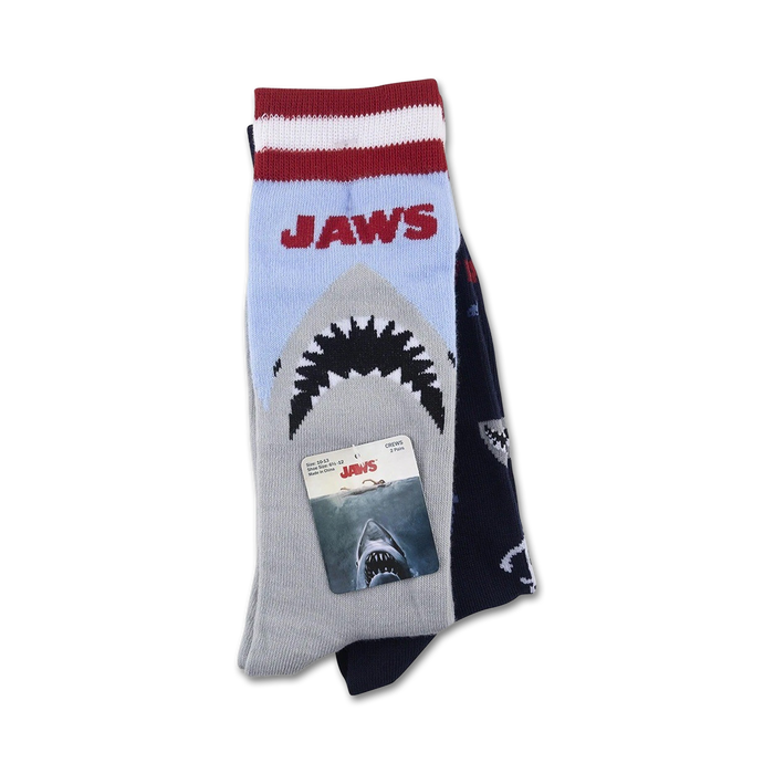 Flatlay product shot of the Jaws BW 2 Pack socks showing both socks, one on top of the other, with attached product tag.
