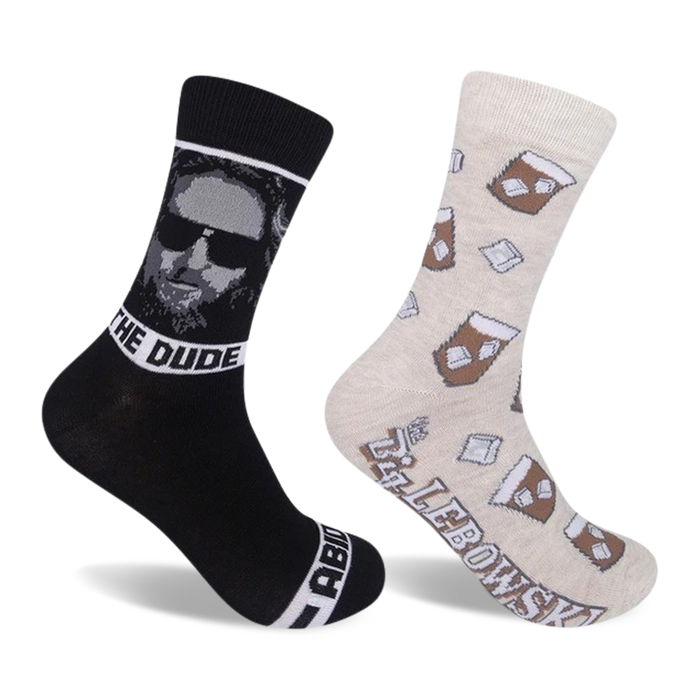 Two crew socks; one black with The Dude's portrait and 'The Dude' text, the other beige with brown coffee cups and ice cubes.  }}