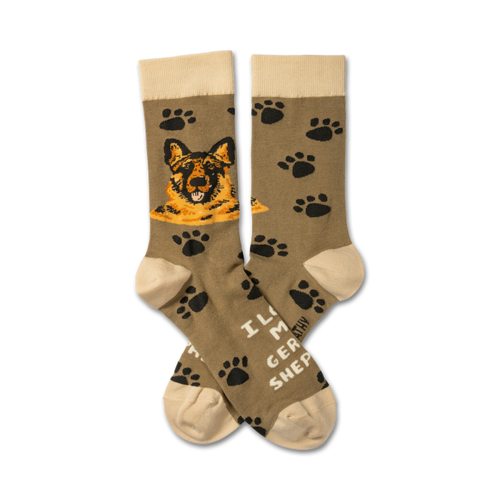 brown crew socks with black paw print pattern and 