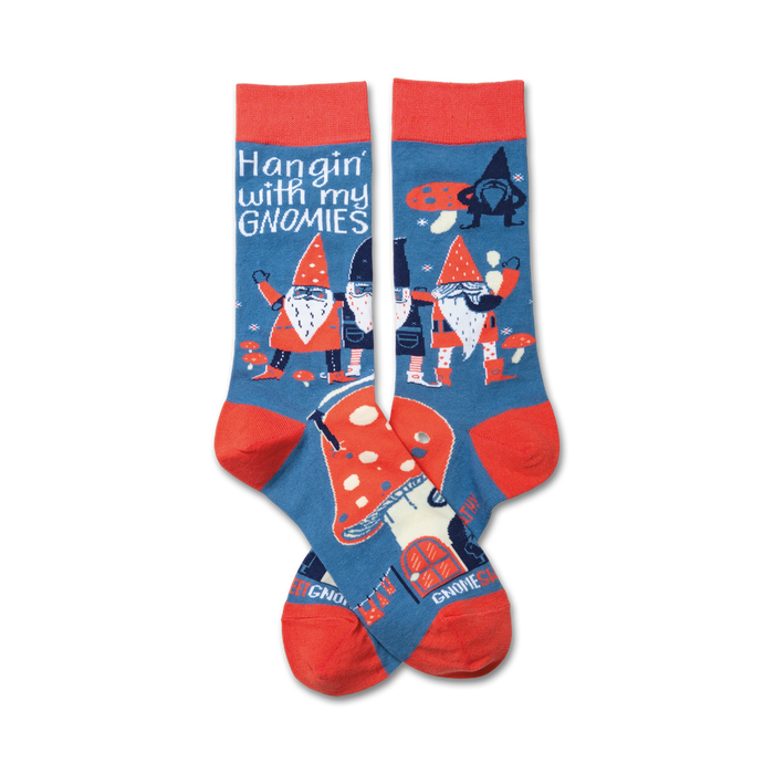 A pair of crew socks in blue and red. The socks feature a whimsical design of gnomes, mushrooms, and the phrase 'Hangin' with my gnomies'. }}