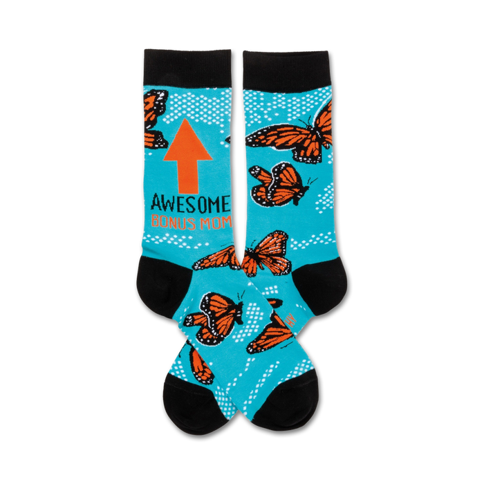 blue crew socks with orange butterfly pattern, black toes and heels, and 