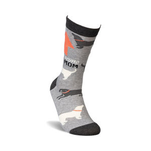 Lifestyle shot of 'Awesome Dog Mom' socks on a model's foot, showing the sock's fit and design.