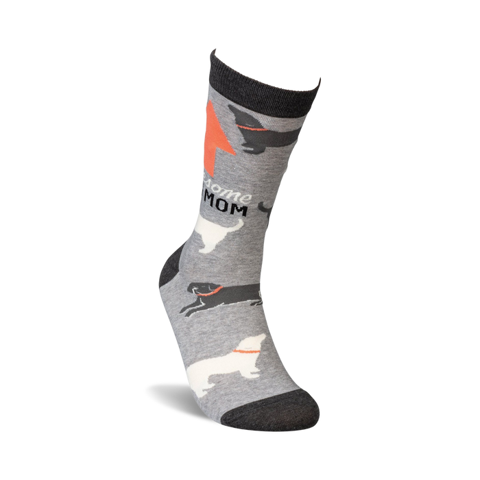 Lifestyle shot of 'Awesome Dog Mom' socks on a model's foot, showing the sock's fit and design.