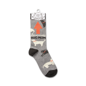 Product shot of 'Awesome Dog Mom' socks hanging on a retail display card.