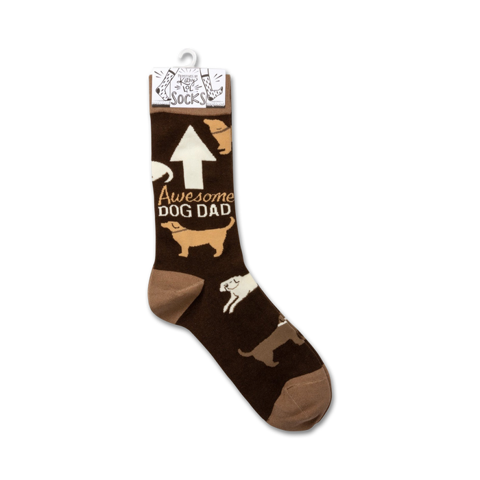 Close-up of the 'Awesome Dog Dad' socks on a hanger.  Shows product packaging and sock detail.