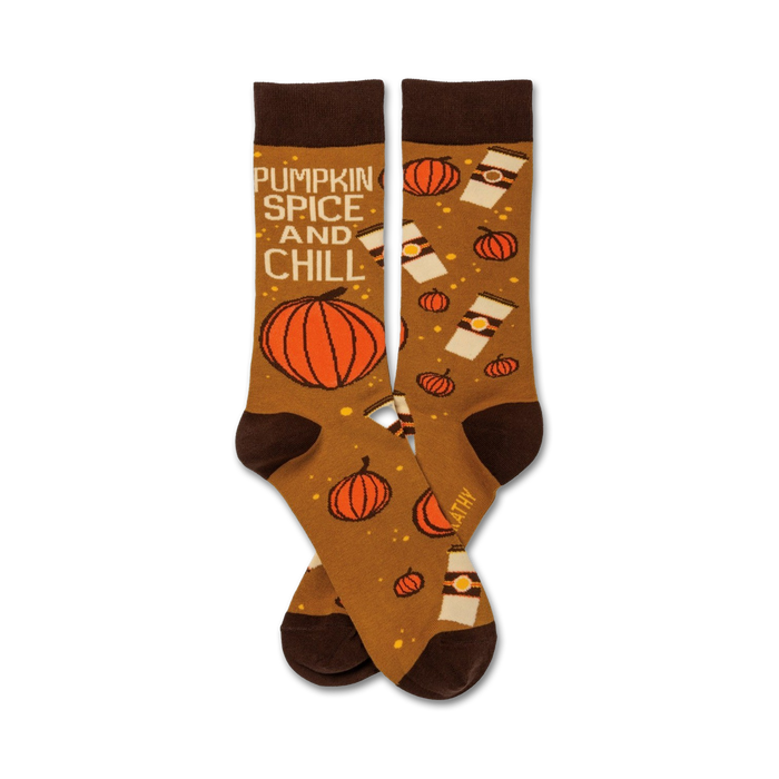 pumpkin spice and chill socks: brown crew socks with pumpkins, coffee cups and text.   }}