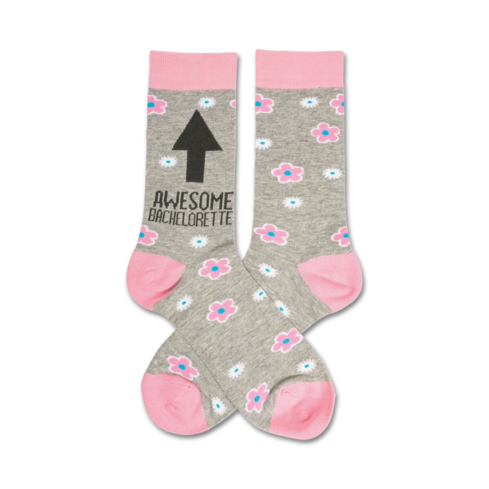heather grey crew socks with pink cuff, toes and heel with a pattern of flowers and the text awesome bachelorette on the leg with an arrow pointing up }}