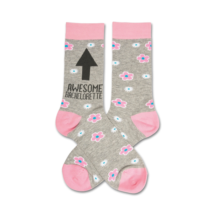 Pair of grey crew socks with pink flowers and an upward-pointing black arrow. Text reads 'Awesome Bachelorette'. }}