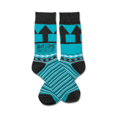 Pair of teal and gray crew socks. Features black arrow design, 'Awesome Bachelor' text, and geometric pattern at the cuff.