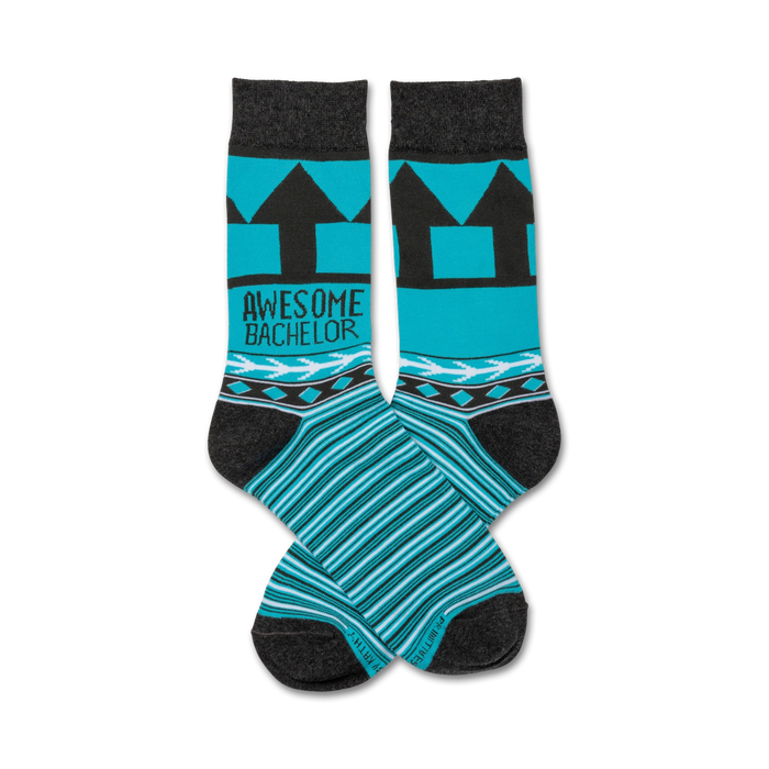 Pair of teal and gray crew socks. Features black arrow design, 'Awesome Bachelor' text, and geometric pattern at the cuff. }}