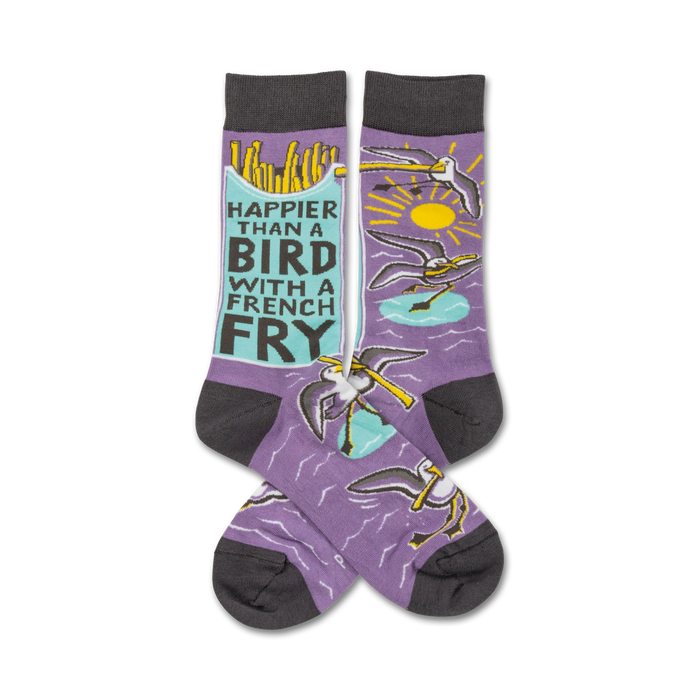 Purple crew socks with a design of birds stealing french fries and the text 'Happier than a bird with a french fry'. }}