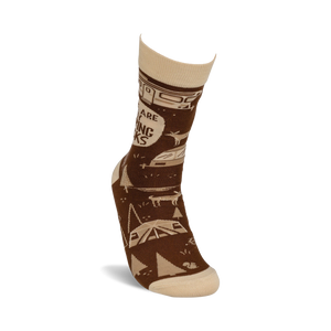 Lifestyle shot of a person wearing one 'These Are My Camping Socks' sock, showcasing the design and fit.