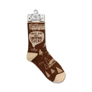 A pair of brown and cream colored socks with the words 