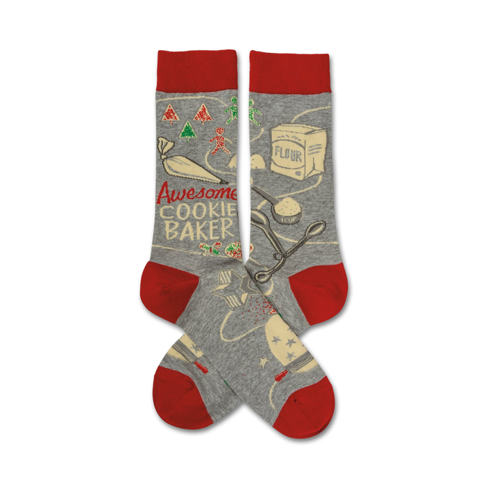 Grey crew socks with a red cuff.  The design features illustrations of cookie baking tools and ingredients, along with the text 'Awesome Cookie Baker'.
