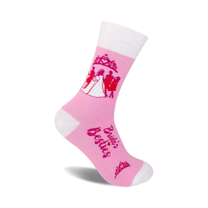 crew socks in pink and white with a silhouette of a bride, groom, and two bridesmaids. text on socks reads 