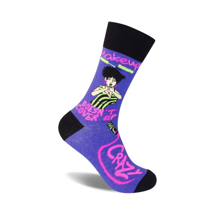 Purple crew socks with a black cuff.  They feature a retro-style graphic of a woman and the text, 'Makeup Doesn't Cover Up Crazy' in neon pink and green.