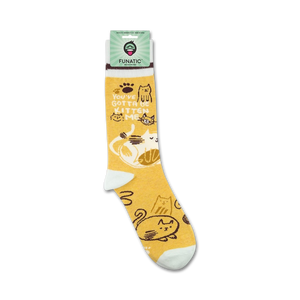 Product shot of 'You've Gotta Be Kitten Me' socks on a white background, showing packaging.