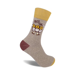 Crew socks in grey, mustard yellow, and burgundy.  Features a graphic design that says 'Rock the Dad Bod' with cartoon arms.