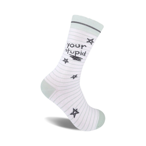 White crew socks with thin pale green stripes, a playful 'Your Stupid' message, and scattered dark gray stars.