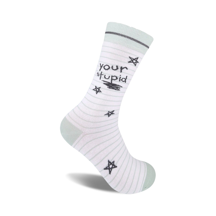 White crew socks with thin pale green stripes, a playful 'Your Stupid' message, and scattered dark gray stars.