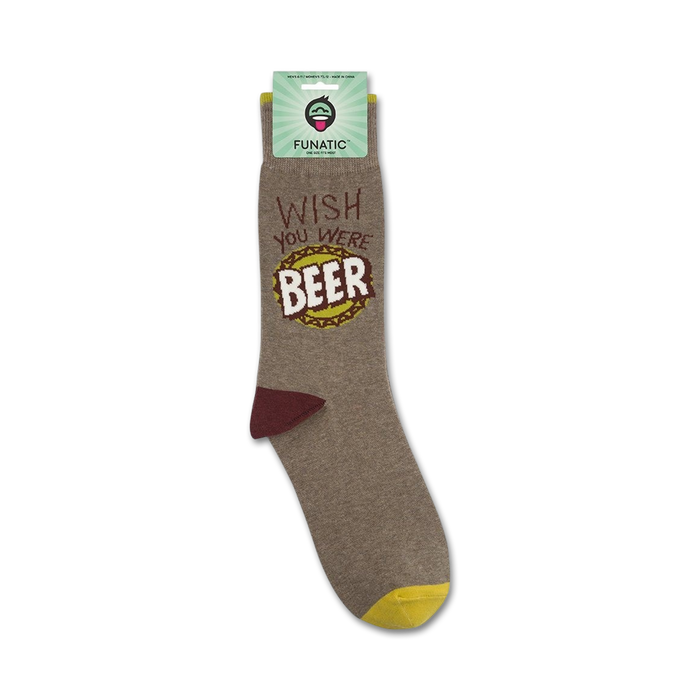Product shot showing 'Wish You Were Beer' socks folded on its packaging.