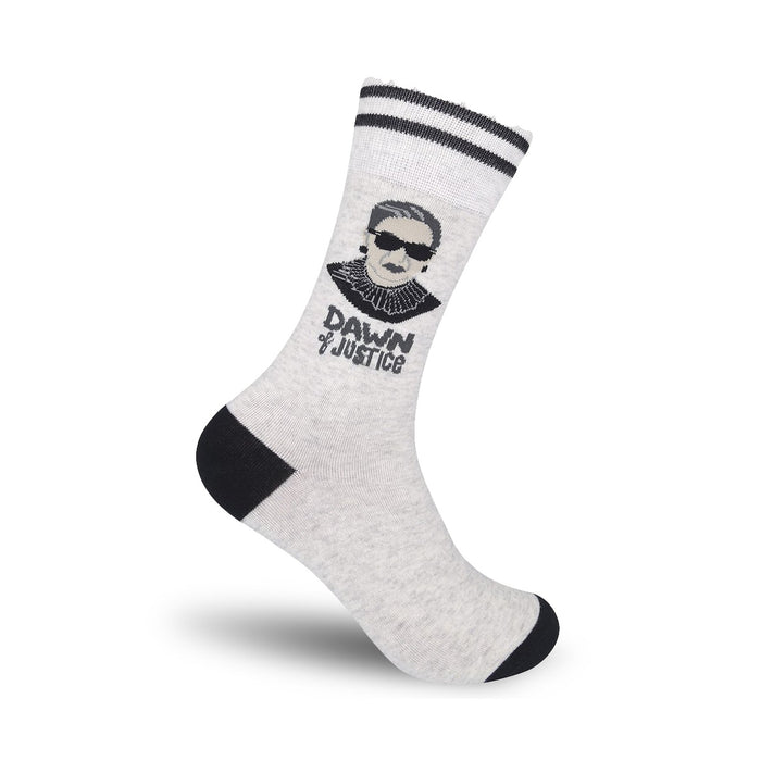 Grey crew socks with a black and white portrait of Ruth Bader Ginsburg, sunglasses, and the phrase 'Dawn of Justice'. }}
