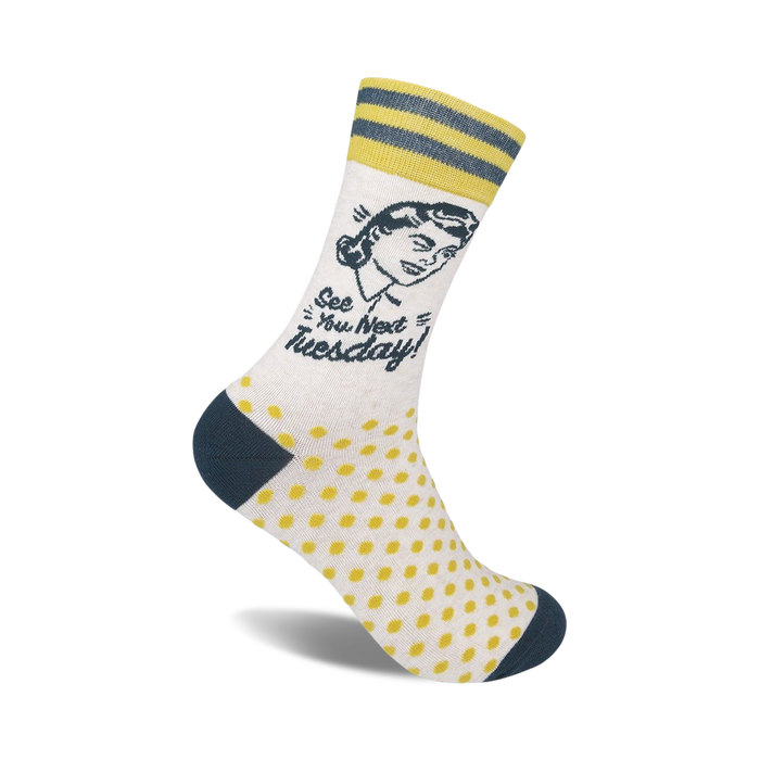 Cream crew socks with yellow polka dots, teal stripes, and a retro woman graphic with the text 'See You Next Tuesday!'
