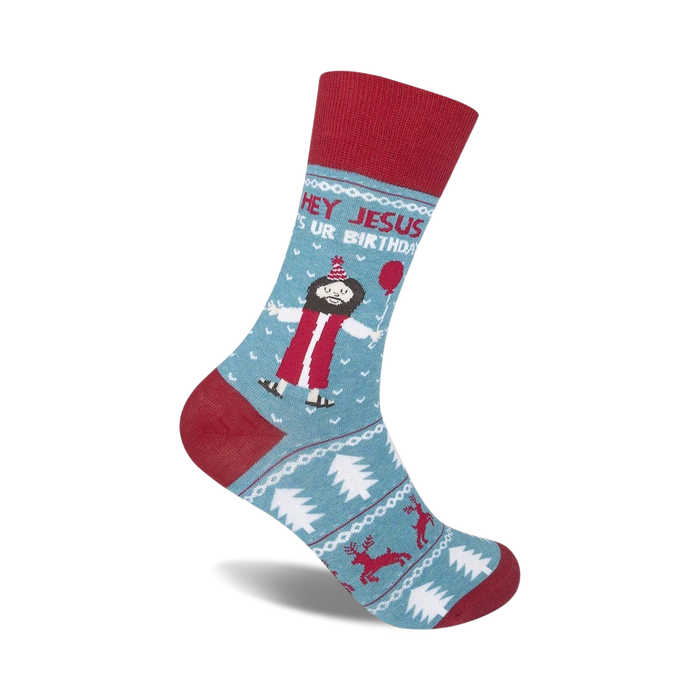Crew socks in teal and red, featuring a cartoon Jesus with a party hat and balloon, surrounded by Christmas-themed designs.
