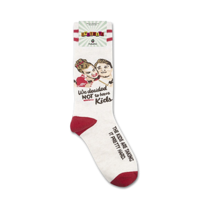 Product shot of 'We Decided Not To Have Kids' socks on their packaging. Shows the full sock design and branding.