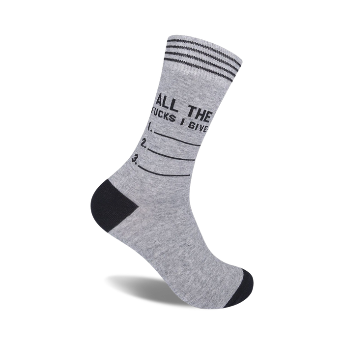 Grey crew socks with black stripes and the phrase 'All The Fucks I Give:' followed by a numbered list. Fun and sarcastic!