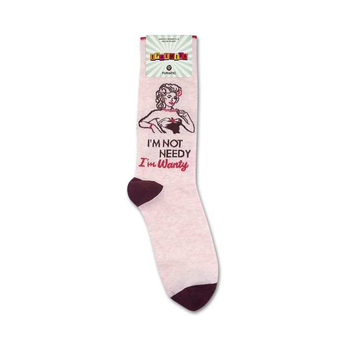 Lifestyle shot showing the 'I'm Not Needy I'm Wanty' socks on a model's feet, highlighting the sock's fit and design in a real-life setting.