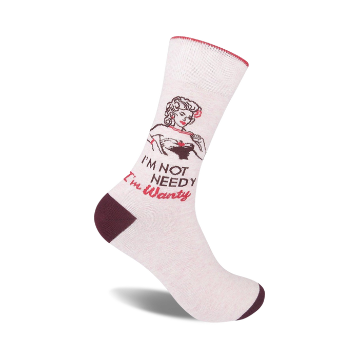 Cream-colored crew socks with a maroon cuff, showcasing a vintage pin-up girl graphic and the text 'I'm Not Needy I'm Wanty'.