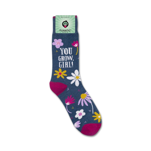 Close-up of 'You Grow, Girl' socks on their packaging.