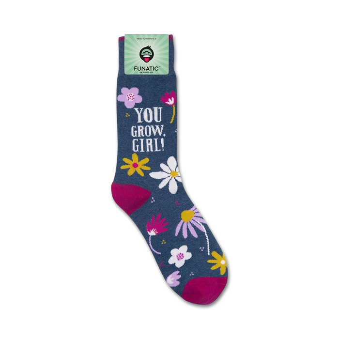 Close-up of 'You Grow, Girl' socks on their packaging.