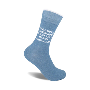 Crew socks in light blue featuring the text 'I hate guys. Nevermind, he just texted me back. False alarm.' in white.