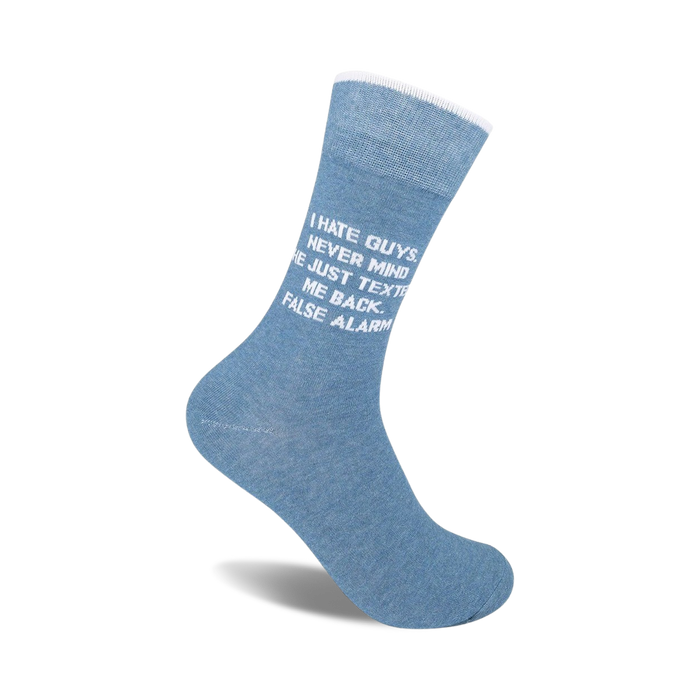 Crew socks in light blue featuring the text 'I hate guys. Nevermind, he just texted me back. False alarm.' in white.