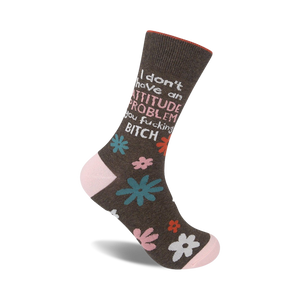 Brown crew socks with a pink cuff, featuring a sassy message and teal, pink, and white floral accents.